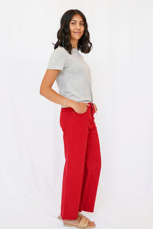KUT Meg High Rise Fab Ab Wide Leg Raw Hem Jean in Ruby Red