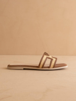 The Ena Brown H Cutout Raffia Slide Sandal