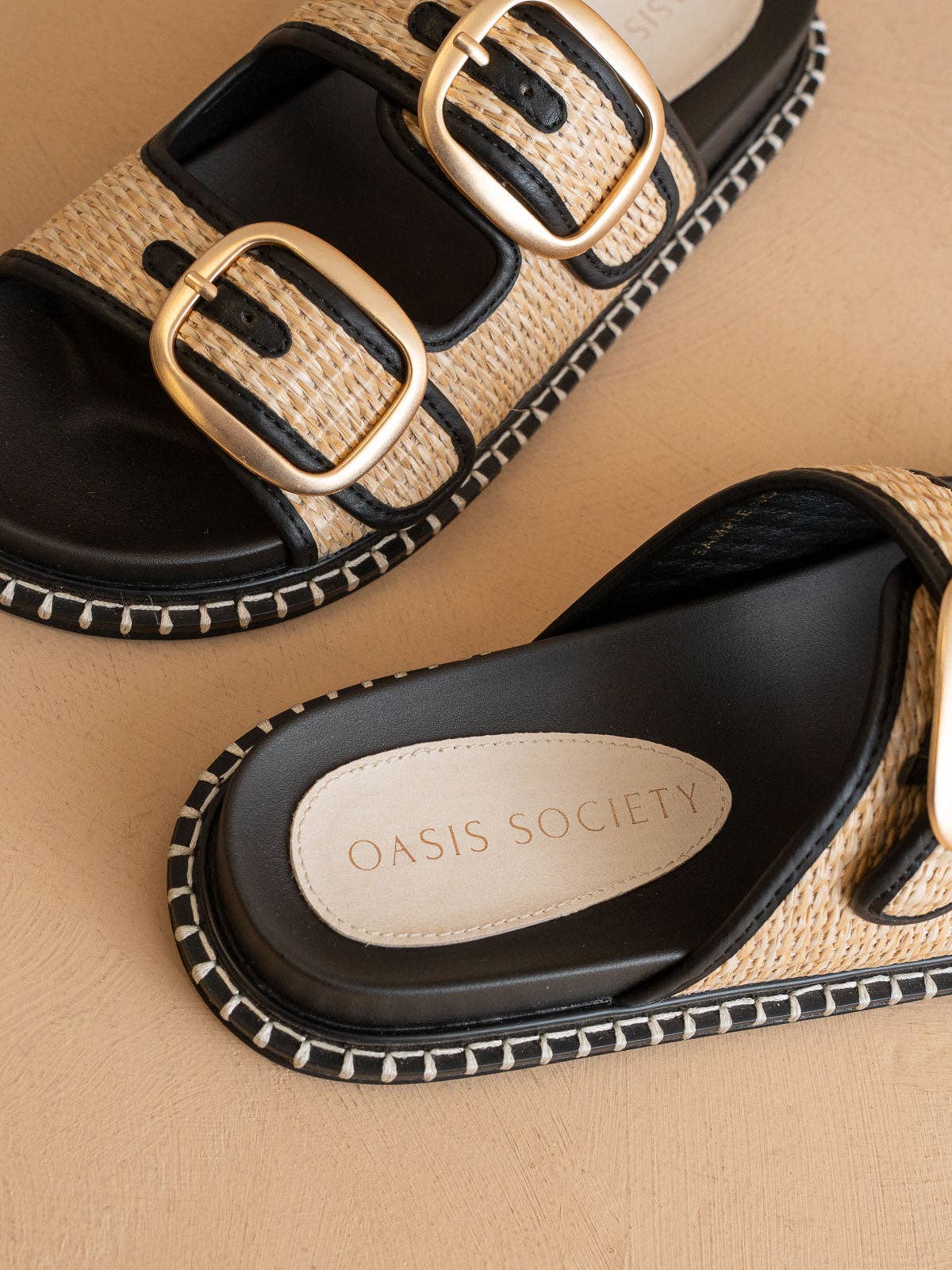 The Daytona Black Two-Tone Raffia Gold Buckle Sandal
