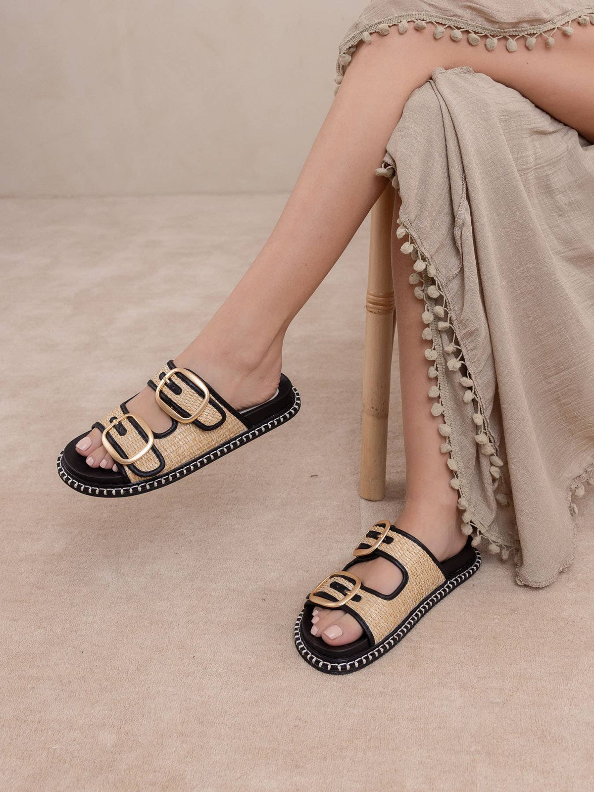 The Daytona Black Two-Tone Raffia Gold Buckle Sandal