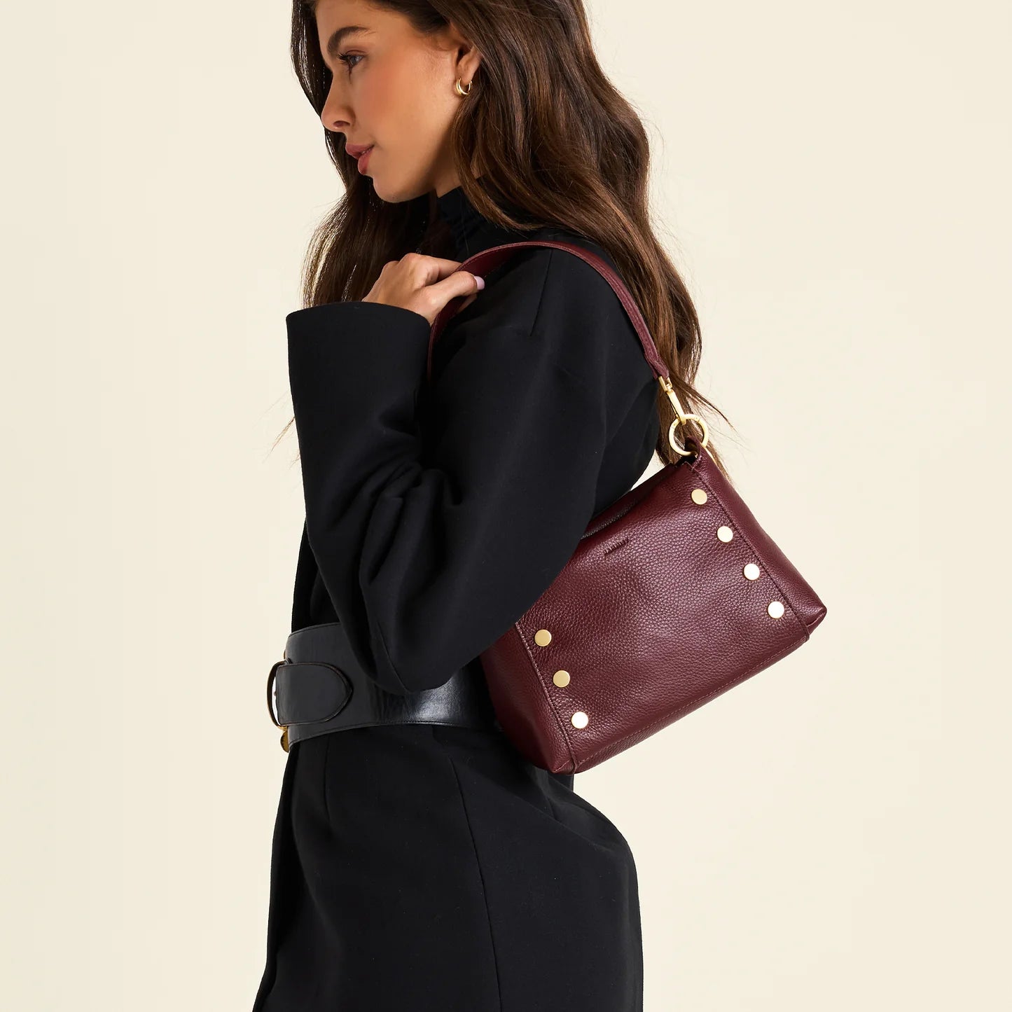 Meet our Bryant medium, a space-efficient style with plenty of room and added accessibility.

Crafted with a deep oxblood red pebble leather with brown and red undertones
Brushed gold hardware
Wear 2 ways: crossbody and shoulder bag
