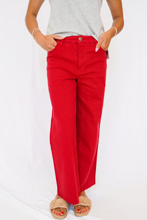 KUT Meg High Rise Fab Ab Wide Leg Raw Hem Jean in Ruby Red