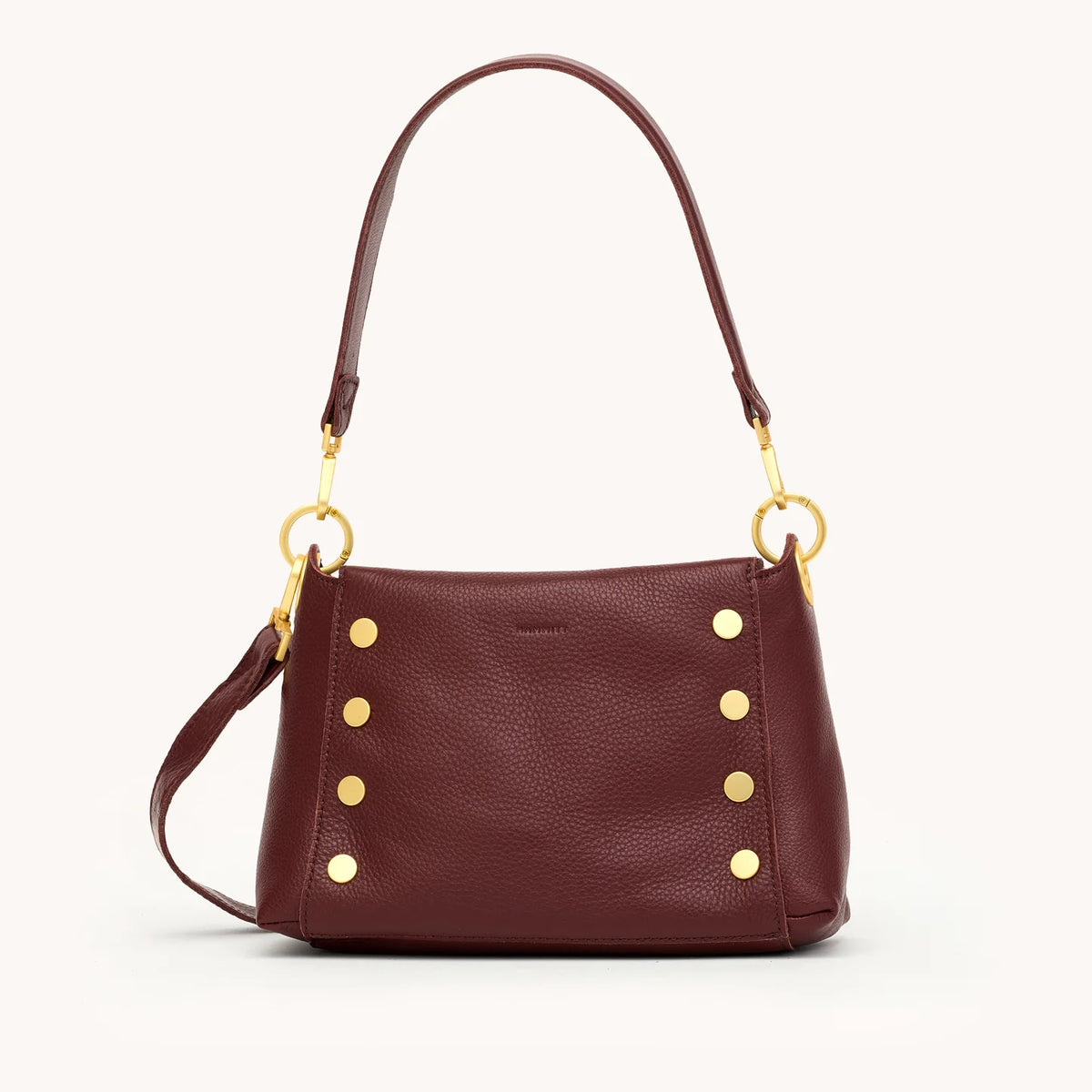 Meet our Bryant medium, a space-efficient style with plenty of room and added accessibility.

Crafted with a deep oxblood red pebble leather with brown and red undertones
Brushed gold hardware
Wear 2 ways: crossbody and shoulder bag