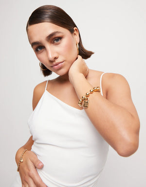 UNODE50 Gold Beaded Bracelet with a Padlock Charm