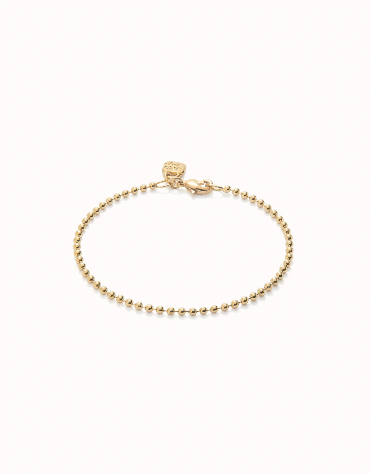 UNODE50 Gold Beaded chain charm bracelet