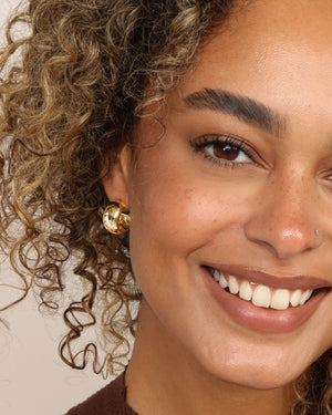 Melinda Maria She's So Smooth Baby Hoops in Gold