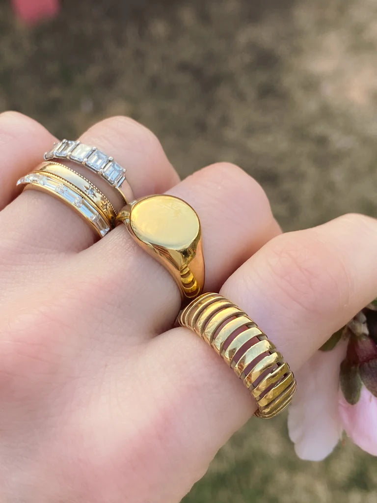 Gold ring in index finger online
